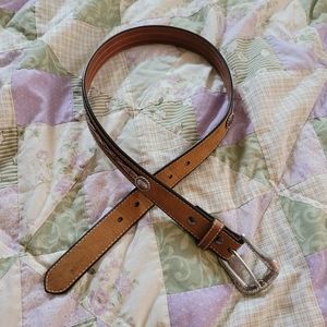 Brown leather Ariat belt with Southwestern detail